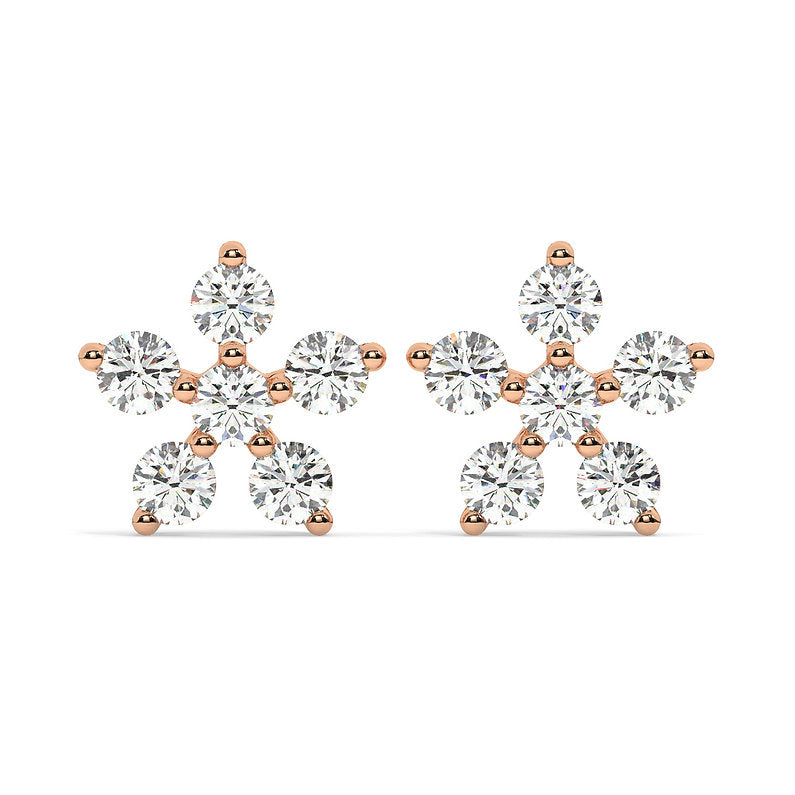 Diamonds effuse an inherent beauty that is entirely too hard to miss. These hexagonal diamond tops are a timeless heirloom encrustusted with pear and marquise diamonds, artistically placed in a gold plated arrangement. As the hexagon represents universal connection, our diamond tops call to those with a spellbound love. The intricate splendour of these earrings explores the world of styling as they lay beautifully with almost everything they may be paired with.