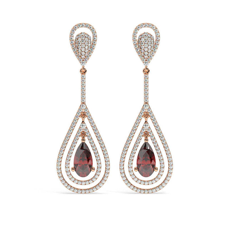 Like a blazing meteor soaring through the night sky, the Raina earrings burst forth with a scintillating shower of sparkling diamonds.