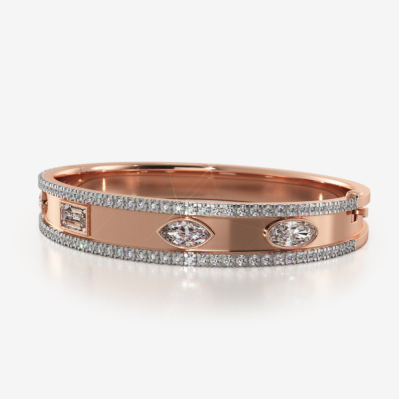 A modern placement of jewels on a rose gold band, the Kalyani bracelet is beauty left to interpretation. The simple shapes of jewels embedded on it allow space for the viewers imagination.