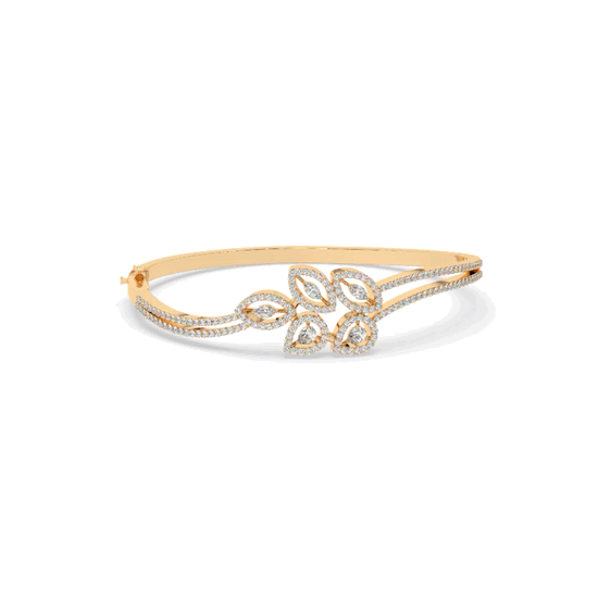 Encapsulating the ephemeral magic that autumn brings in every falling leaf, the Sienna Bracelet is sure to be worn through all seasons. The hinged bangle is made with yellow gold and features a safety clasp for secure wear, and the diamonds sparkle just so, making it an item to be cherished throughout the changing times.