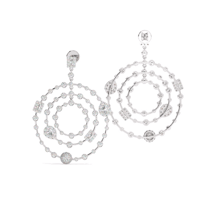 Our Chandelier Earrings are the enchanting union of a variety of shaped diamonds, all delicately and meticulously connected with white gold. These square diamond post-backs drop down into an array of beautiful diamonds that brings the essence of a snowflake falling from the sky. An emblem of prosperity, these Chandelier earrings are the coolest accessory of the season, and one you won’t want to miss.