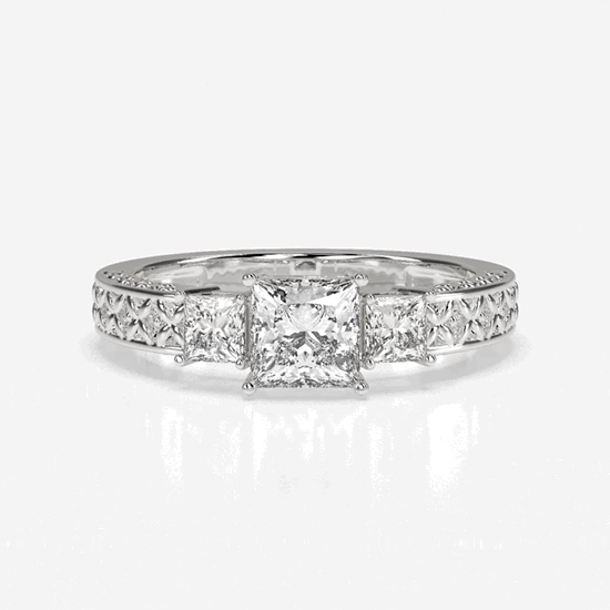 The Aashna ring is set in with a statement square cut diamond that extends into a band further studded with similar cut diamonds, making it a geometrical and visual treat.