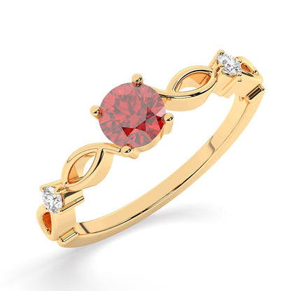 The Amreen ring imitates small branches intwined to hold between them the sweet fruit of love, the small heart that adds a pop of colour to the piece.