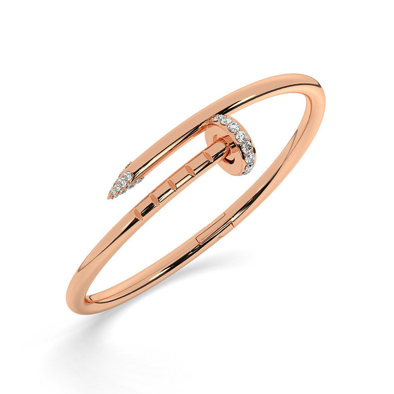 Roughly translated this means, ‘just a nail’, but this bangle is much more than that. Lenishka’s Juste Une Clou bracelet is made with rose gold, meeting in the center with diamond and white gold accents. This bangle brings sparkle and strength together. A popular modern design, our Juste Une Clou is about making a statement with everyday luxury items and it’s so beautiful you may just never take it off.