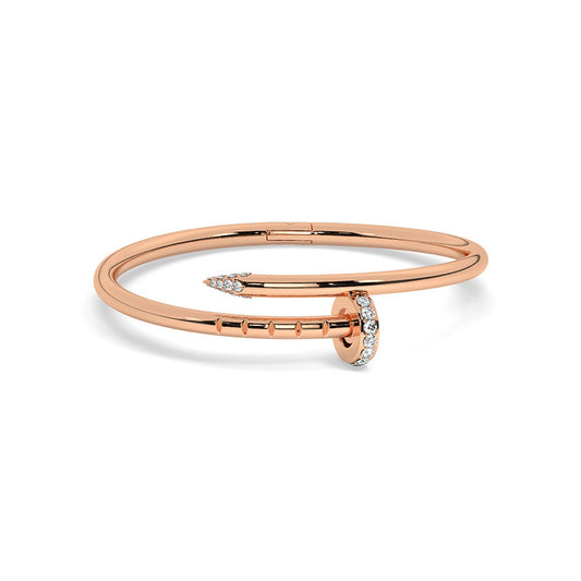 Roughly translated this means, ‘just a nail’, but this bangle is much more than that. Lenishka’s Juste Une Clou bracelet is made with rose gold, meeting in the center with diamond and white gold accents. This bangle brings sparkle and strength together. A popular modern design, our Juste Une Clou is about making a statement with everyday luxury items and it’s so beautiful you may just never take it off.