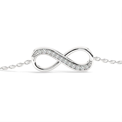 A dainty piece showcasing a small infinity sign in the centre to harmonize the design with a sense of continuity and flow.