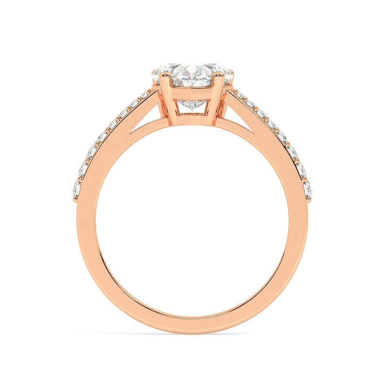 The Saira Ring stand as an ode to all matters of the heart. Perfectly suited for anyone that has a soft spot in yours. A band studded with diamonds meeting upto a heart shaped one to complete the design.